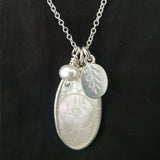 Antique mother of pearl oval pendant