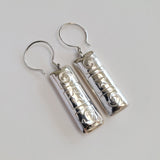 Spiral and star pillow earring