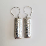 Spiral and star pillow earring