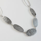 Long ovals pebble necklace