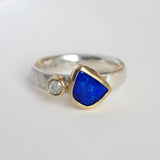 Bright blue opal and diamond ring