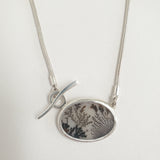 Dendritic quartz oval pendant