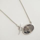 Dendritic quartz oval pendant