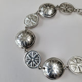 Embossed flower bracelet