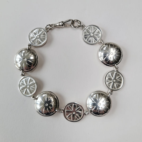 Embossed flower bracelet