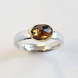 Golden zircon texture ring