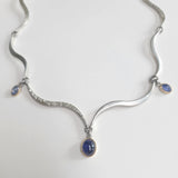 Iolite and tanzanite wave necklace