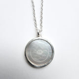 Antique mother of pearl disc pendant