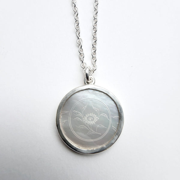 Antique mother of pearl disc pendant