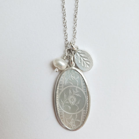 Antique mother of pearl oval pendant