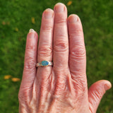 Oval glitter opal and diamond ring