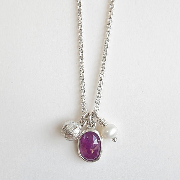 Pink sapphire cluster pendant