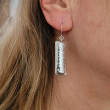 Spiral and star pillow earring