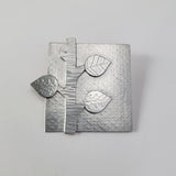Square branch brooch