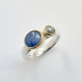 Star sapphire and grey diamond ring