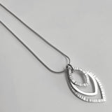 Triple hammered pendant