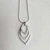 Triple hammered pendant