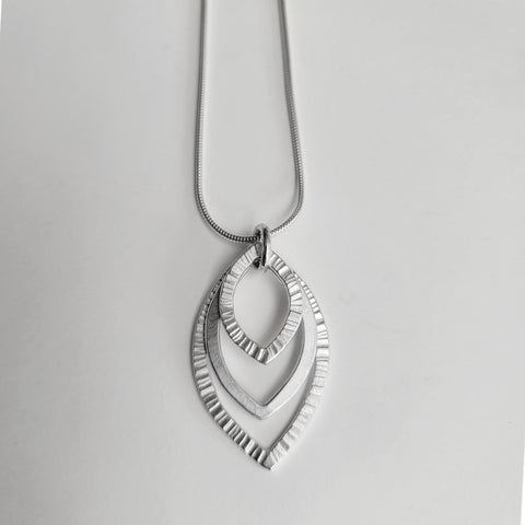 Triple hammered pendant