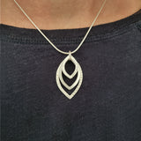 Triple hammered pendant