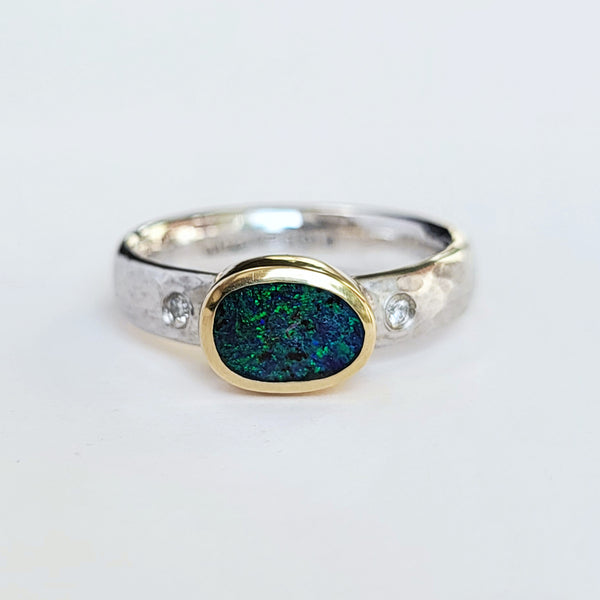 Oval glitter opal and diamond ring