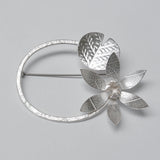 Lily brooch
