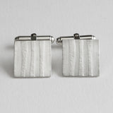 Embossed texture cufflink