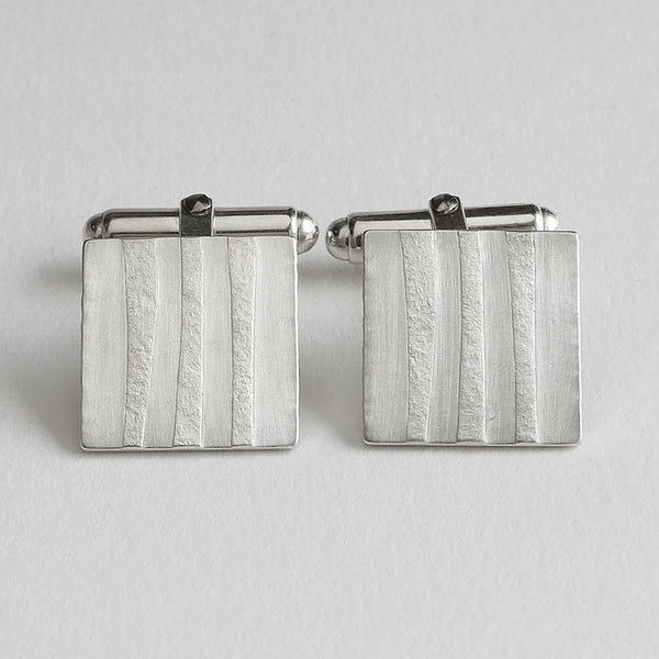 Embossed texture cufflink