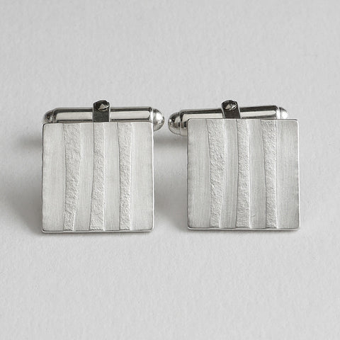 Embossed texture cufflink