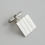 Embossed texture cufflink