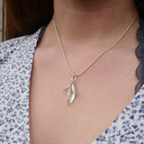 Double seed pod pendant