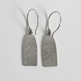Pierced leaf tag drop earring