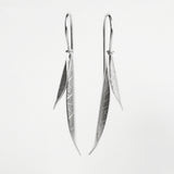 Long curved seed pod earring