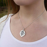 Pierced leaf pendant