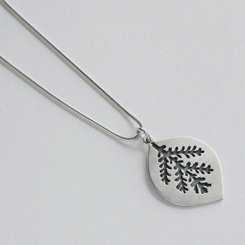 Pierced leaf pendant