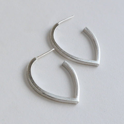 Teardrop hammered hoop earring