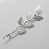 Twig brooch
